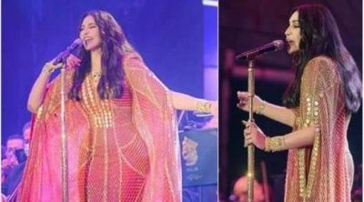 أحلام تضيف عملات ذهبية على إطلالتها (صور) 