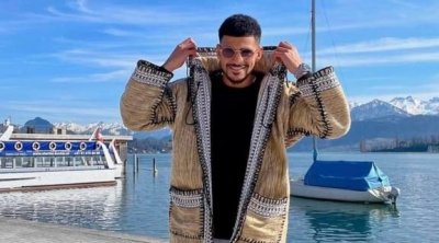 محمد دراغر يرتدي 'القشابية' التونسية في سويسرا 