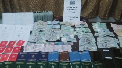 الإطاحة بشبكة مختصة في تزوير جوازات سفر و بطاقات تعريف وطنية 