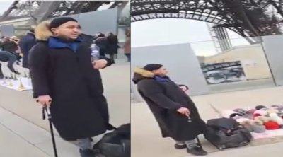شاهد ... تونسي يبيع في ملابس تحت إيفل الشهير (فيديو)