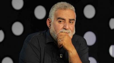 توجيه 3 تهم إرهابية للصحفي زياد الهاني 