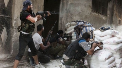 القاعدة في سوريا تقطع راس مقاتل معارض عن طريق الخطأ