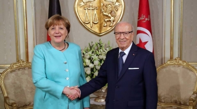 ميركل تفوز باتفاق لترحيل المهاجرين غير الشرعيين الى تونس 