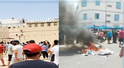 وسط زغاريد النسوة : حرق مقرات النهضة في توزر و القيروان