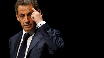 الحكم على ساركوزي بالسجن في منزله لمدة عام واحد